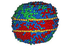 This atomic map of a high-entropy alloy nanoparticle shows different categories of elements in red, blue and green, and twinning boundaries in yellow. Image: Miao Lab/UCLA.
